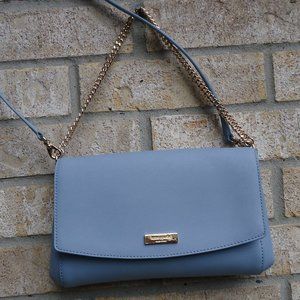 Kate Spade New York light blue leather crossbody shoulder bag.